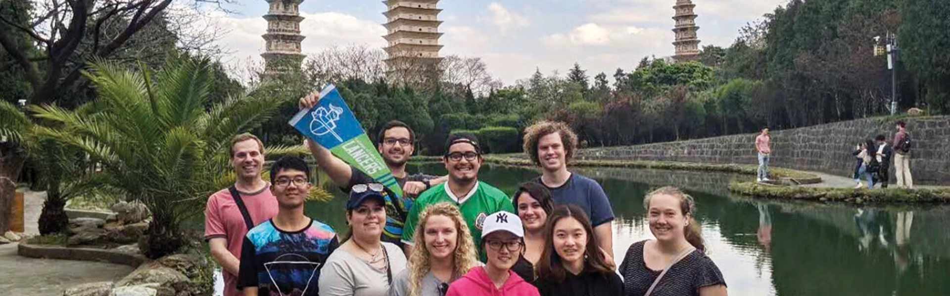 A Study-Abroad group pose for a picture on a school trip in China