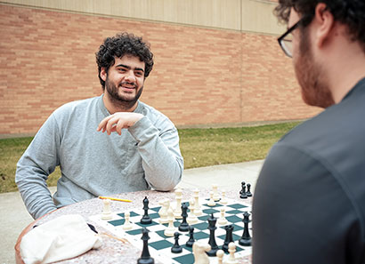 Students playing chess.