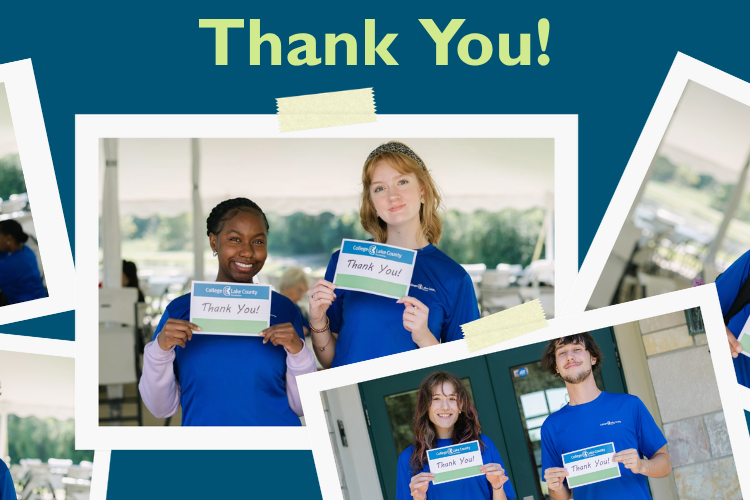 A photo of scholarship recipients with thank you cards