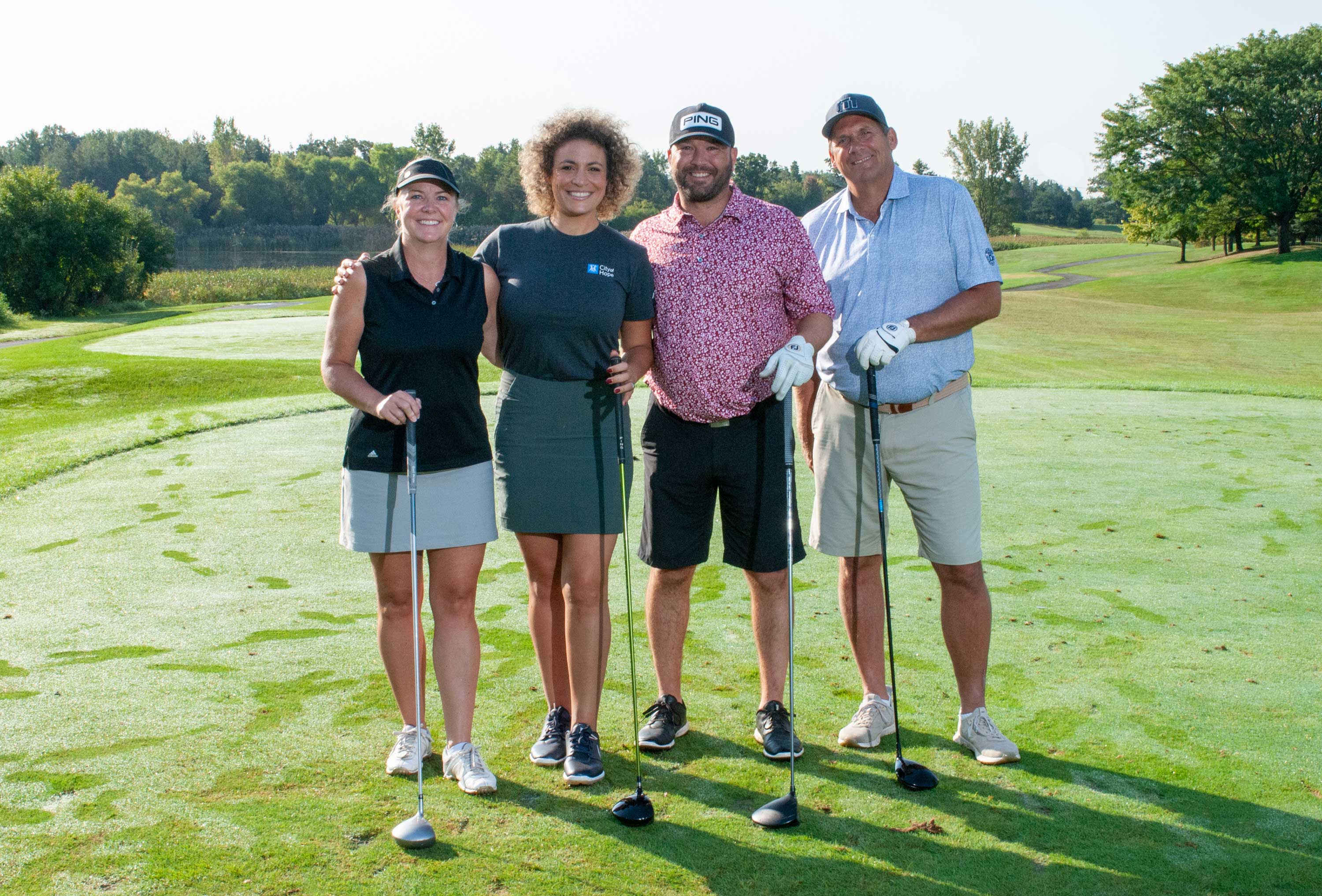 Four golfers at the 2024 Golf Classic