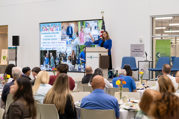 Dr. Suddick speaking at the event