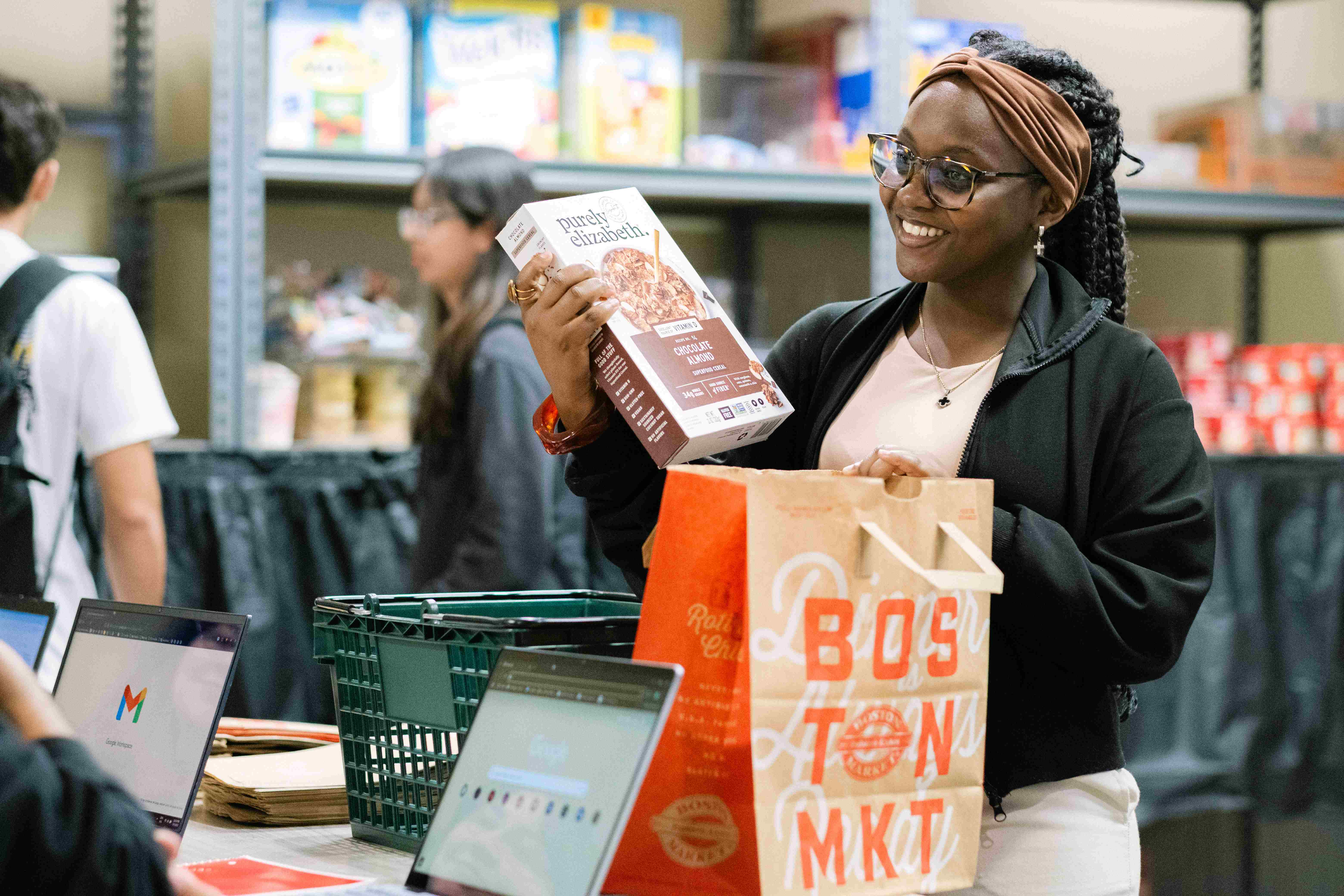 A student checking out at the SHARE Market