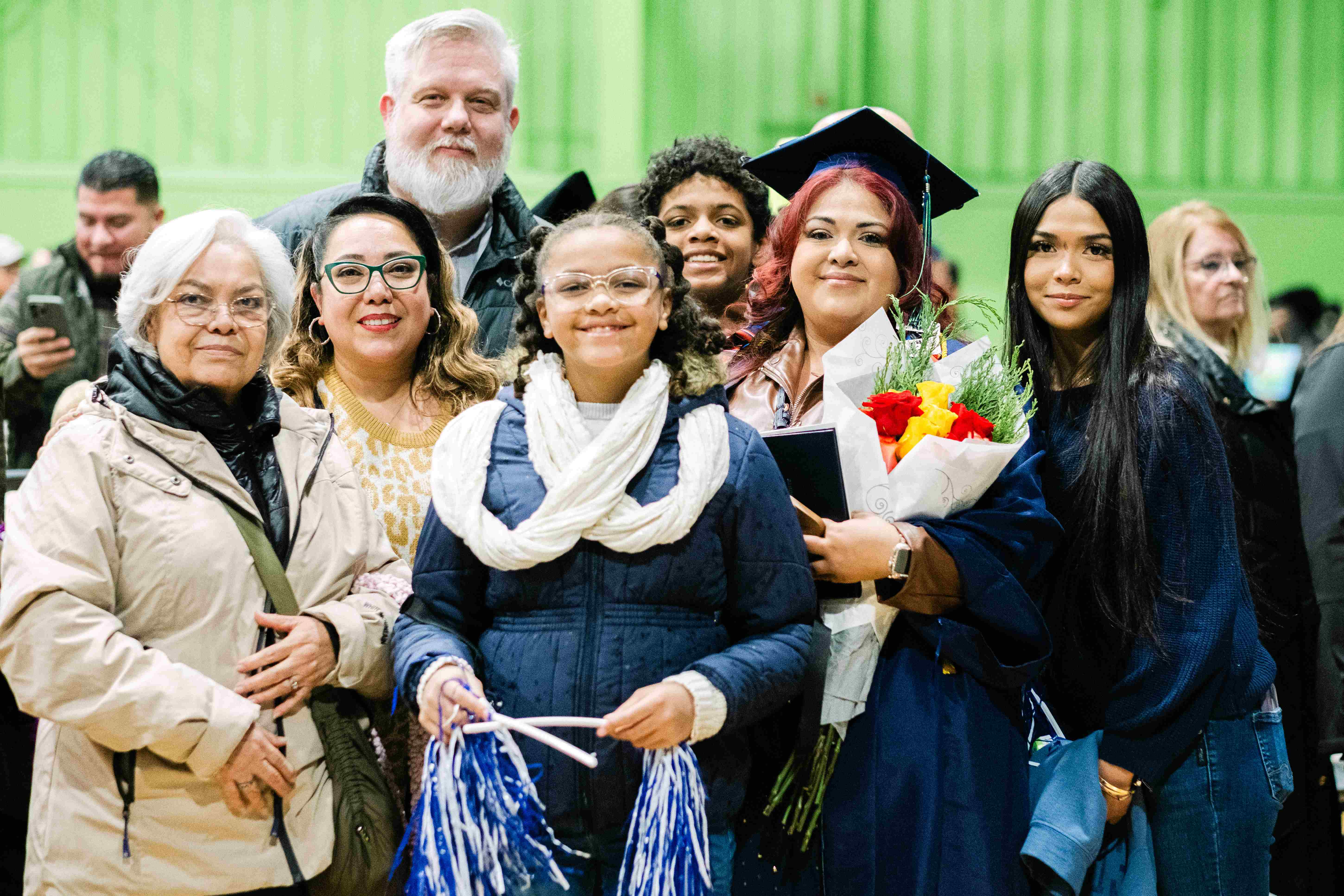A family posing after graduation