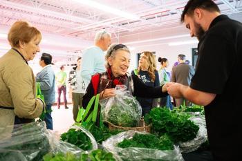 People shopping for produce