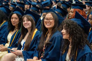 Happy grads in the crowd