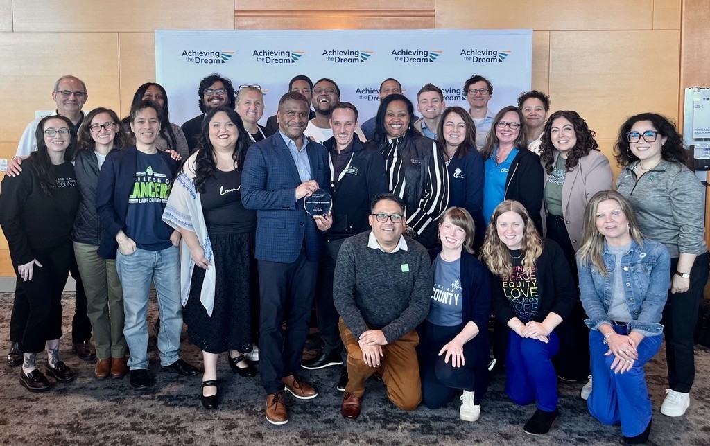 A group photo of CLC employees with the Achieving the Dream distinction