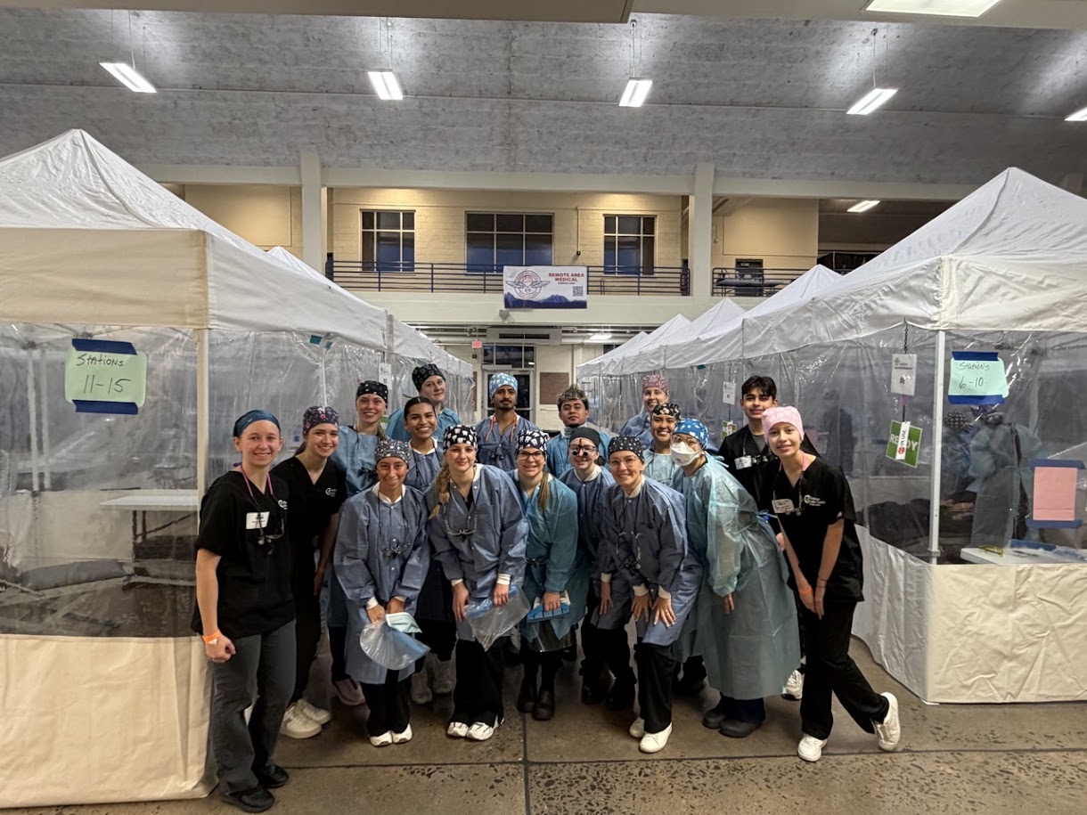 Dental students posing at the event