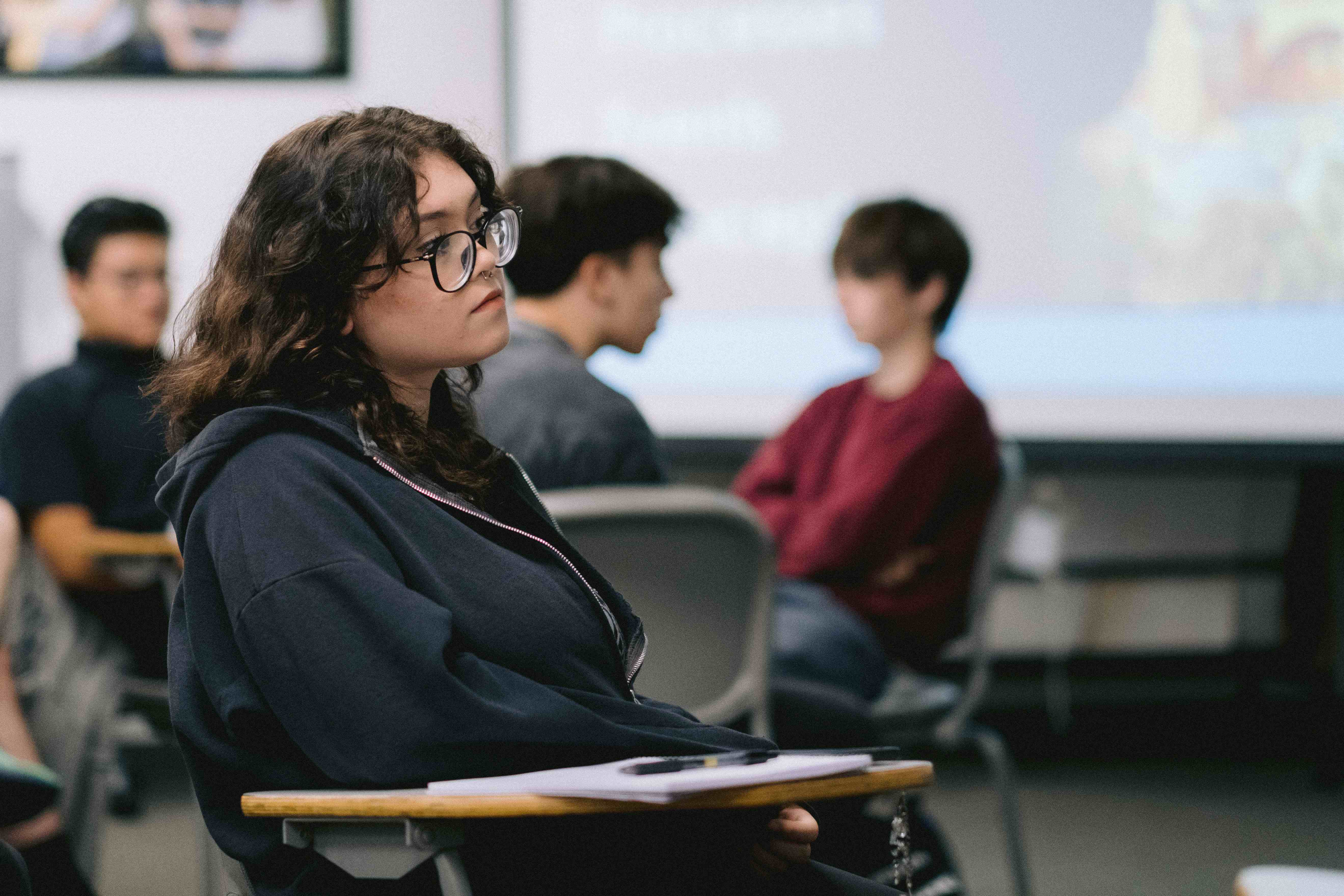 A student in class listening
