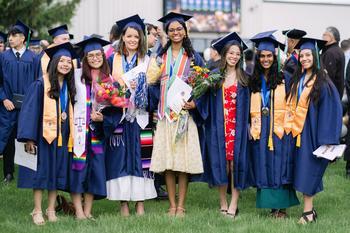 Graduates posing together
