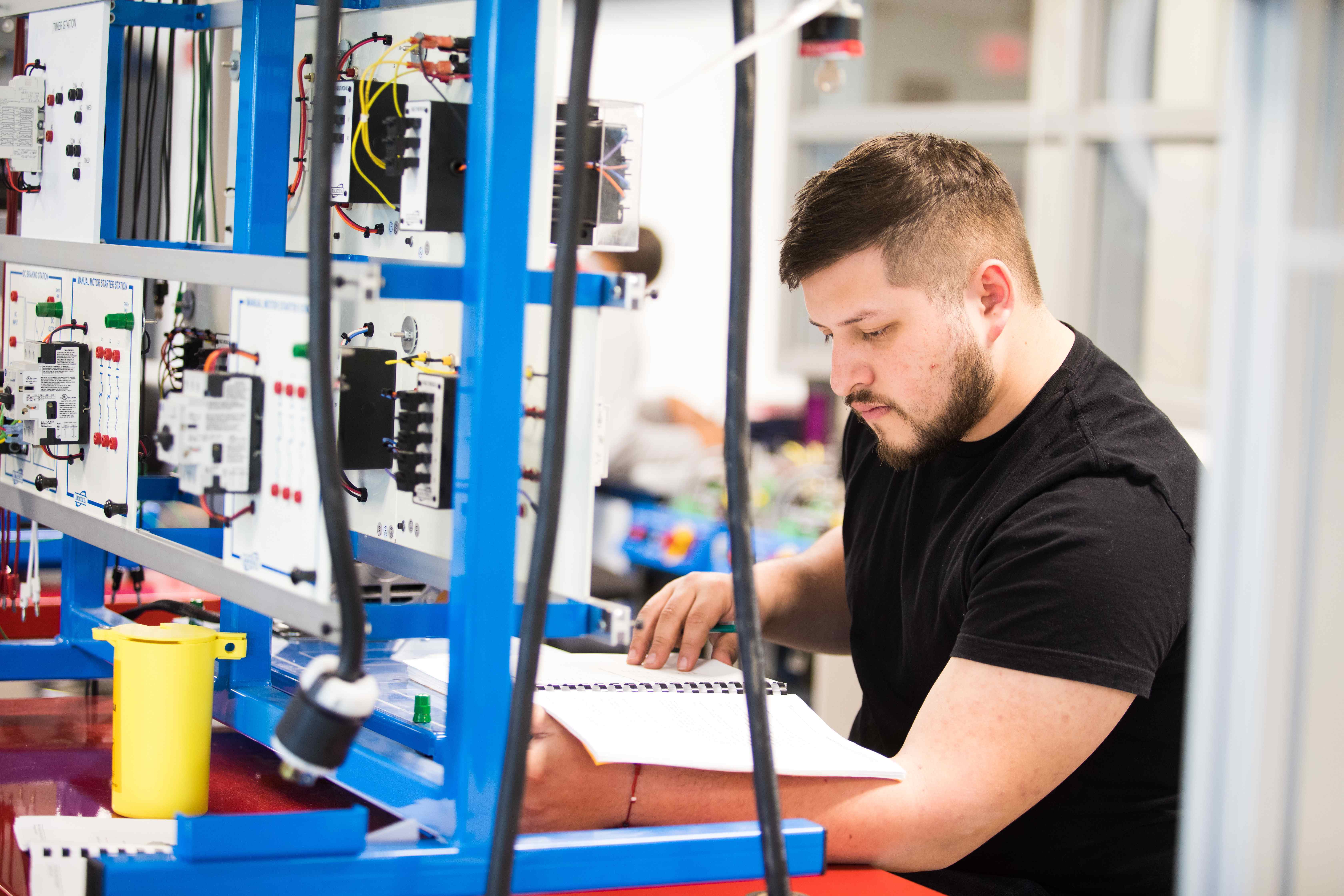 A student working in the mechatronics lab