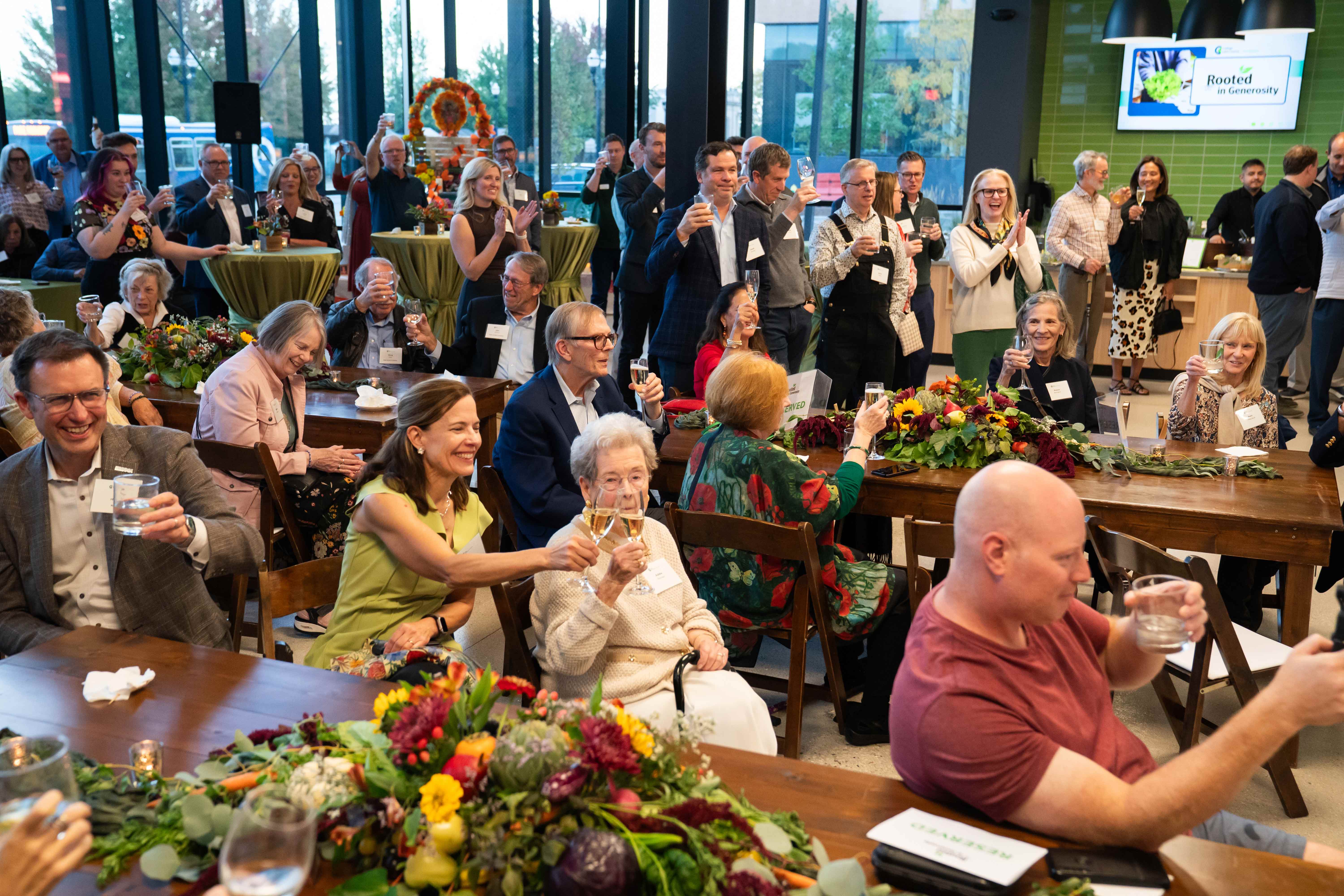 Guests raise their glasses in a celebratory toast during Rooted in Generosity, an Oct. 9 donor celebration honoring the philanthropic supporters who helped bring the College of Lake County's new Urban Farm Center to fruition.