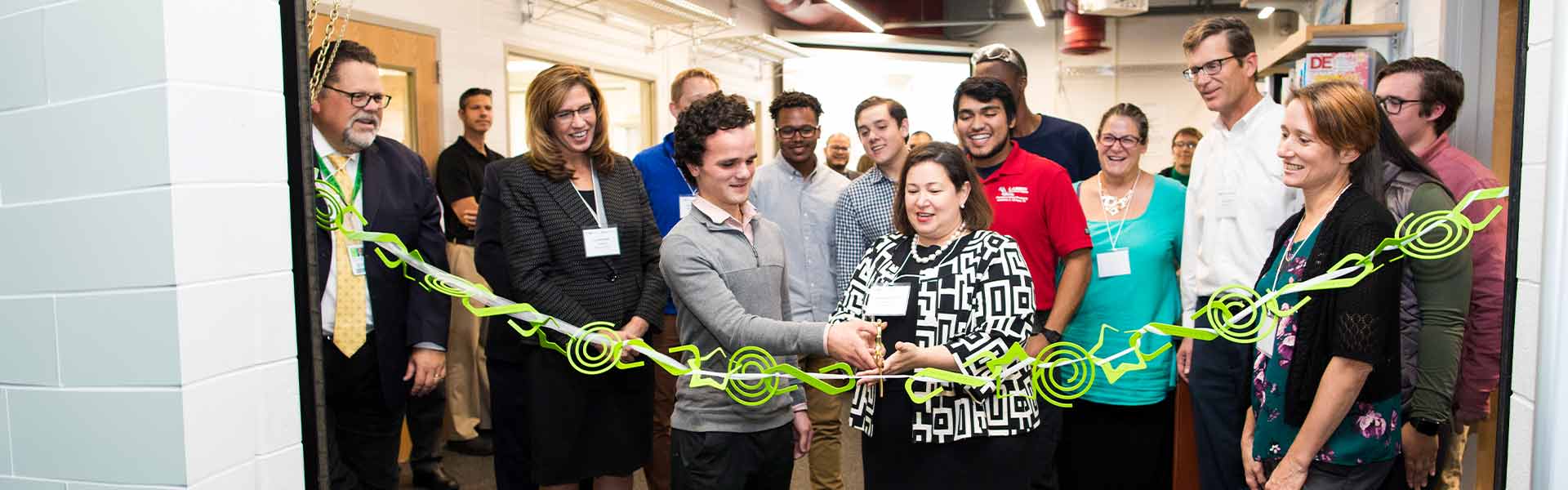 Foundation directors, college leadership and others at ribbon-cutting ceremony