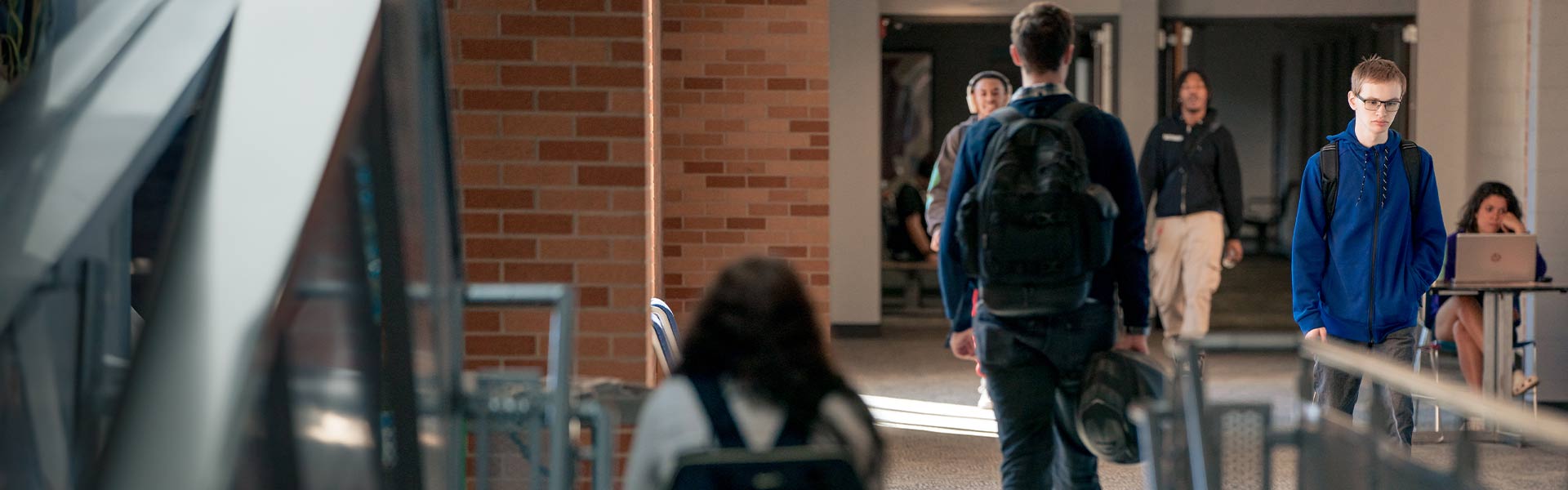 Students walking down a hallway