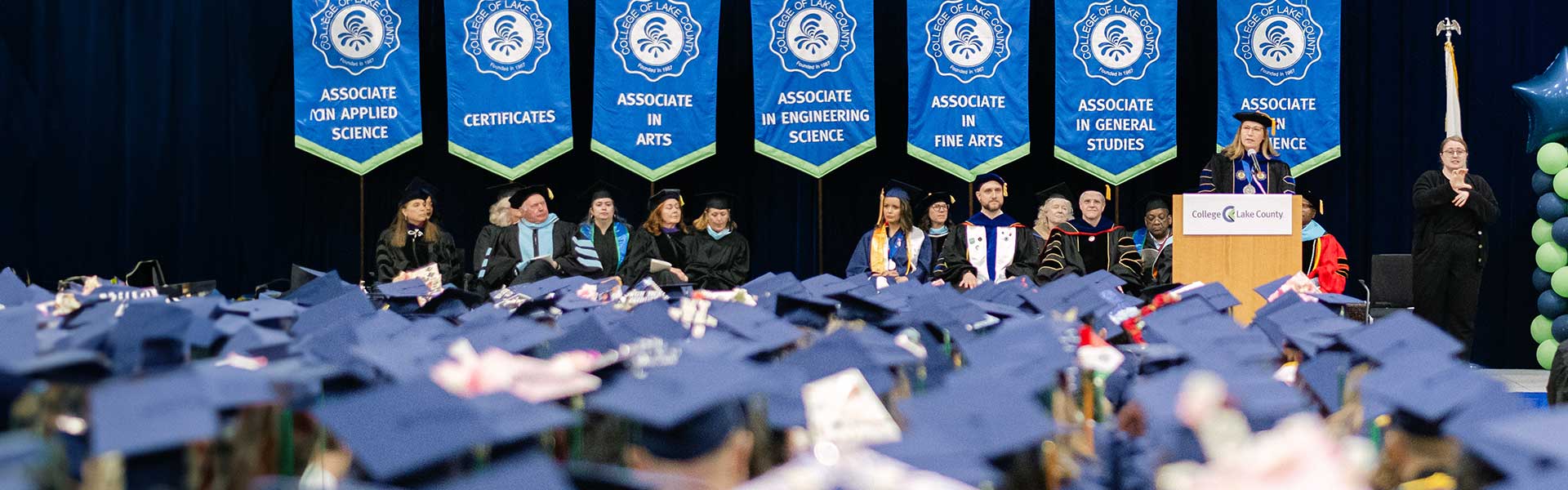 President Lori Suddick addressing students at commencement ceremony
