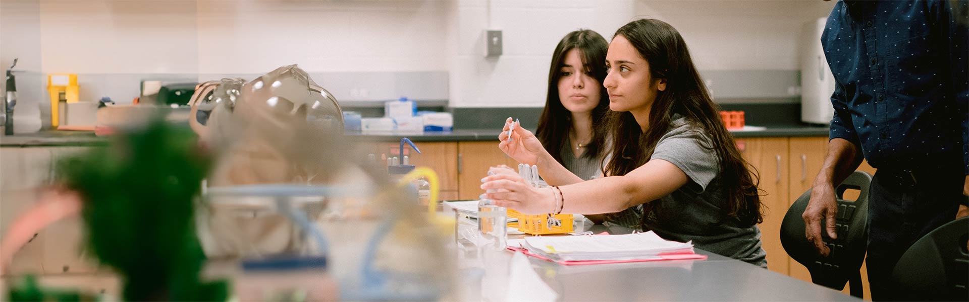 Two students working on a lab