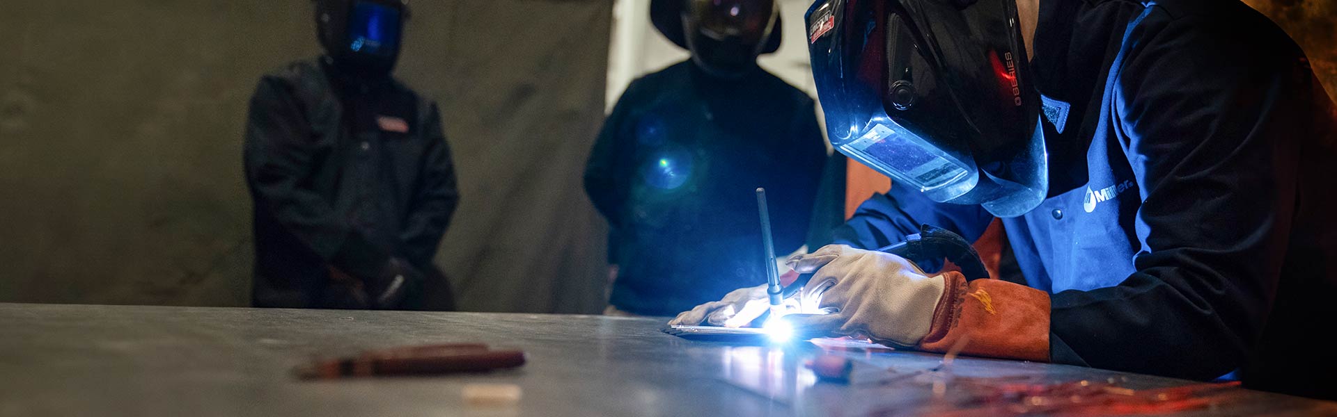 Welder Professor demonstrating welding