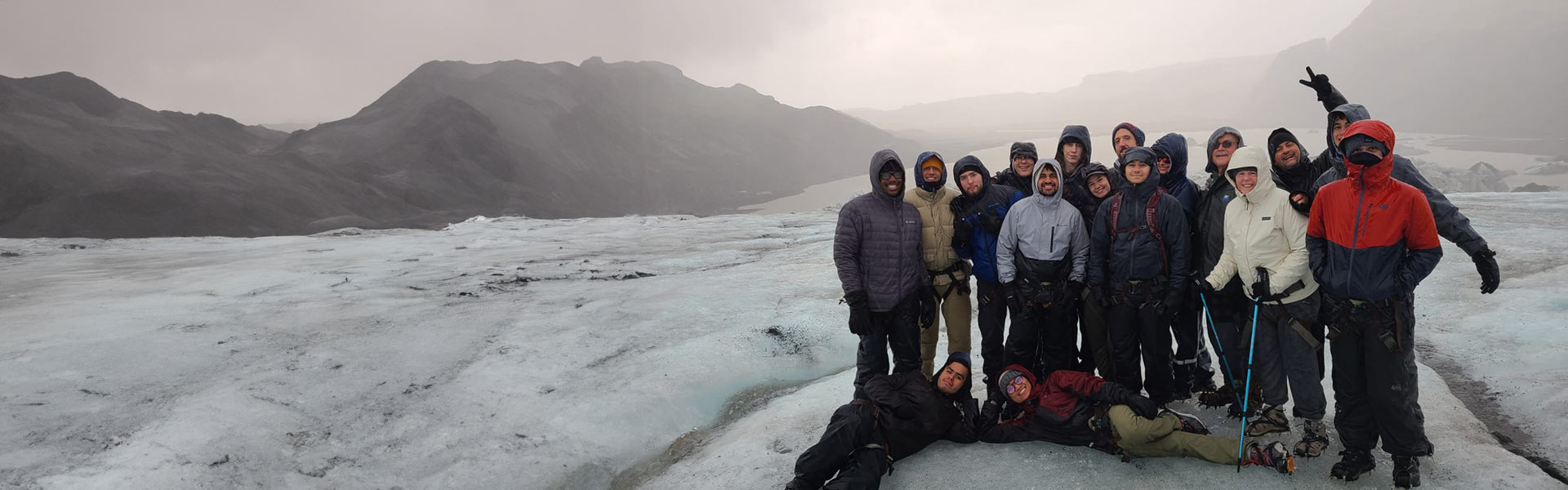 Group of students standing on a glacier in Iceland