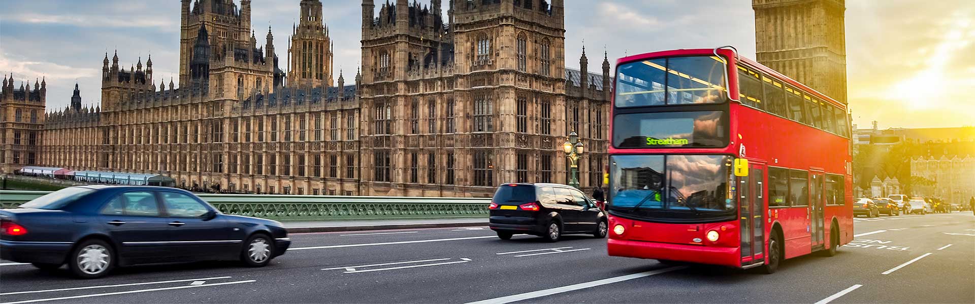 London street scene featuring red double-decker bus