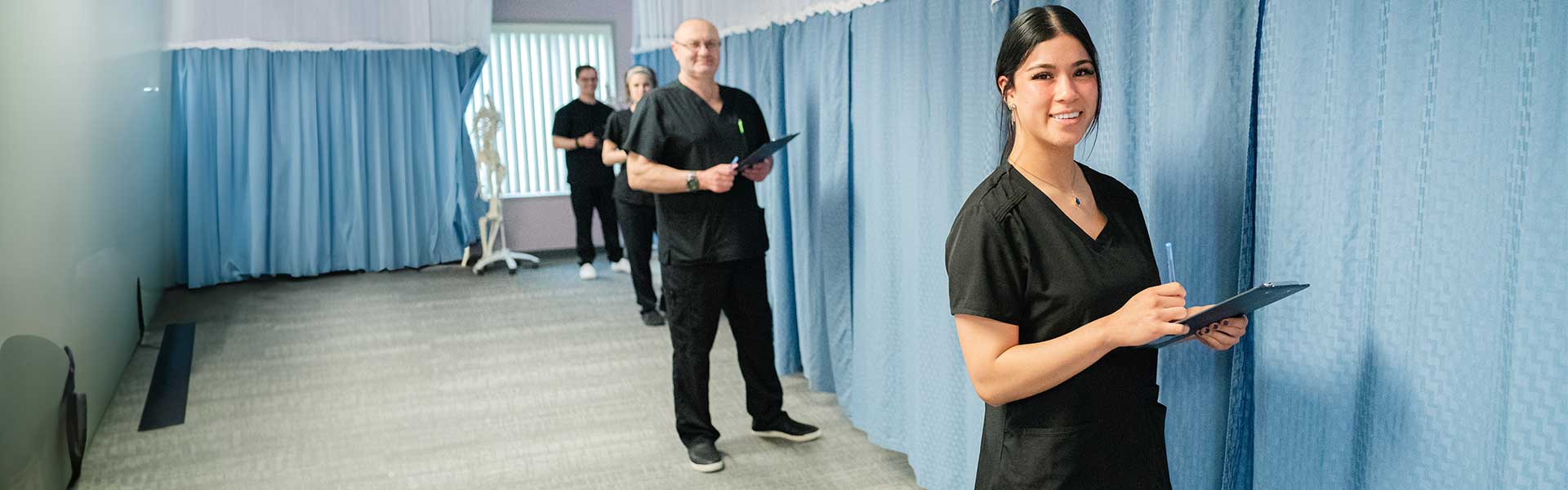 Students preparing for massage therapy clinic