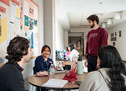 Photo of students talking.