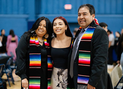 Latinx family at a graduation ceremony