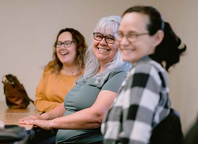 Women in class enjoying a laugh