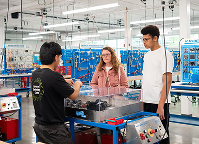 Guests learning about Industrial Technology program at ATC Open House