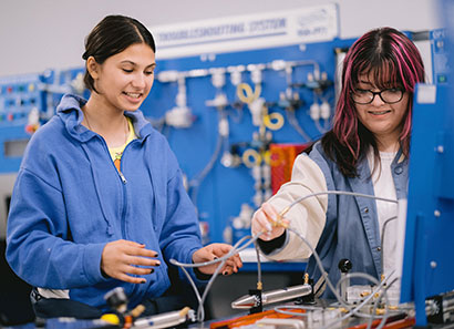 Two students doing hands-on learning at ATC, Gurnee