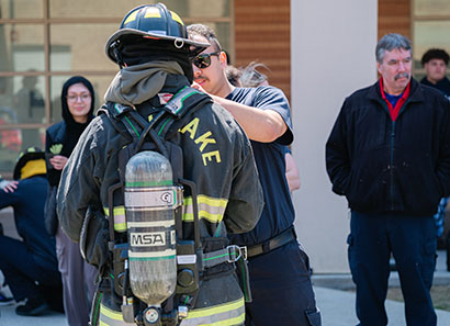 Students preparing for demonstration in fire science technology