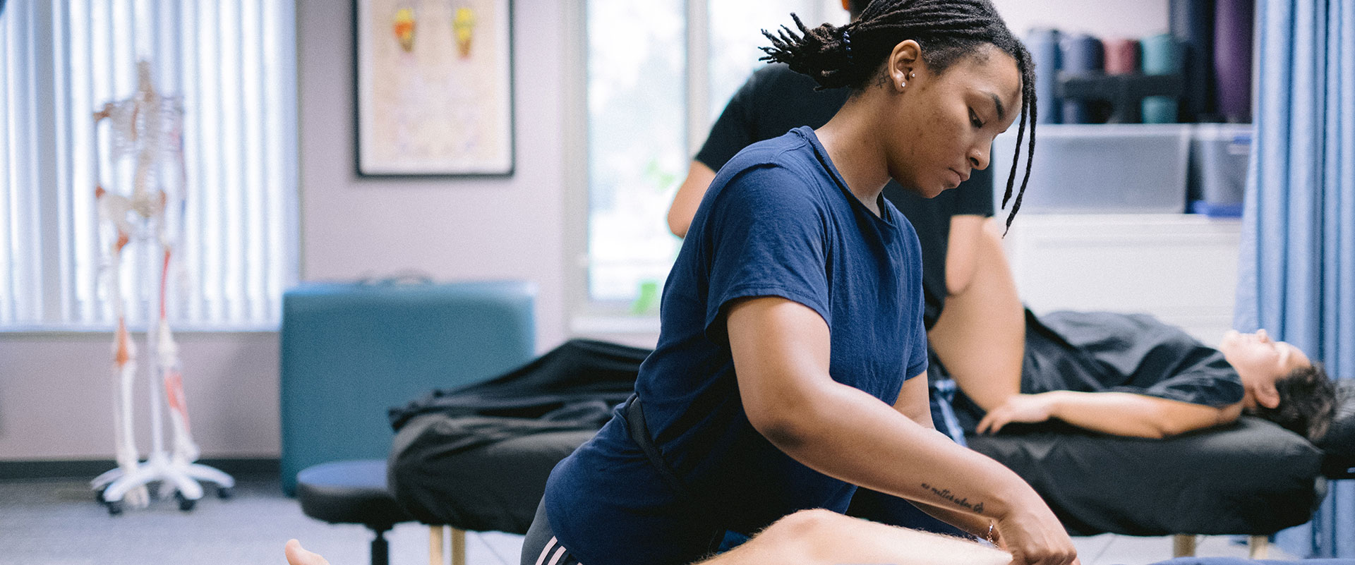 Massage therapy student practicing skills at Southlake Campus, Vernon Hills