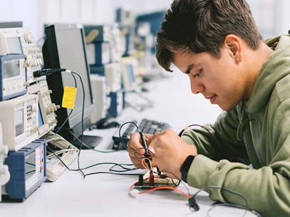 Student works with electrical wires