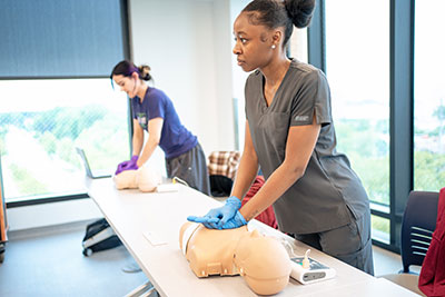 Students practicing CPR skills