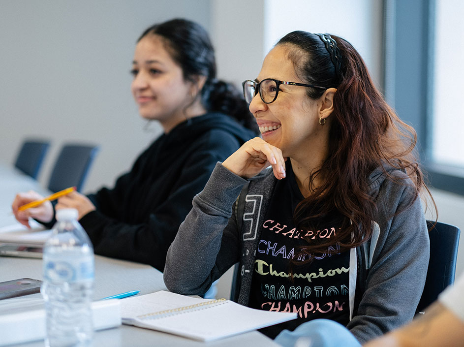Two students enjoying class discussion