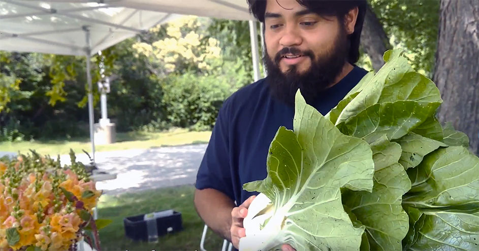 CLC Horticulture student Edwin Santamaria working at the CLC Farm Market, Grayslake, IL