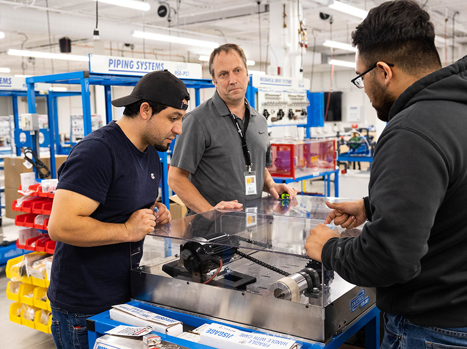 Students and instructor in the Industrial Technology Lab.