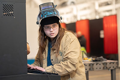 Student programming remote welding machine