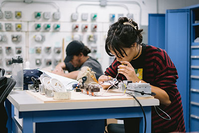 Students in HVAC lab practicing electrical connections