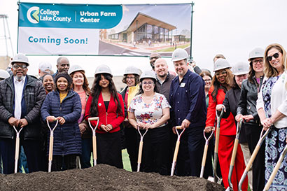 Attendees at the Urban Farm Center groundbreaking