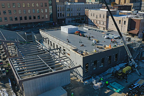 Aerial view of construction in progress for the Urban Farm Center