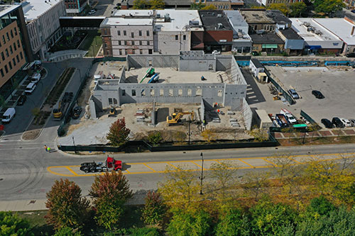 Overhead view of Urban Farm Center building in progress, walls are up