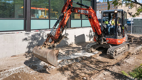 Construction equipment working outside Urban Farm Center