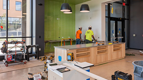 Working on the interior of the Urban Farm Center