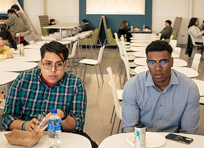 A black and hispanic student at the Willow Cafe