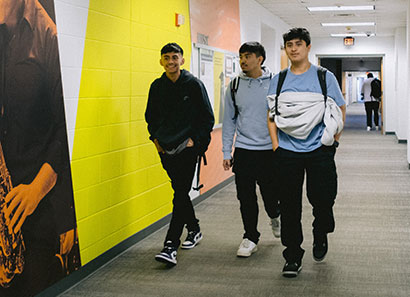 Future CLC students walk through a hallway